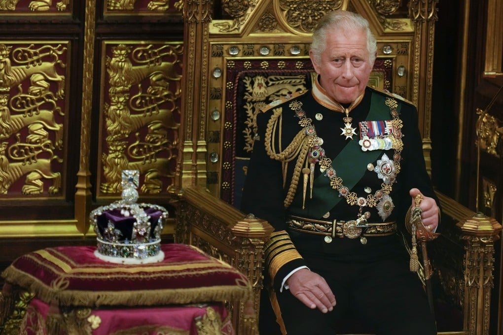 Prince Charles seated next to the queen’s crown during the State Opening of Parliament. Photo: AP