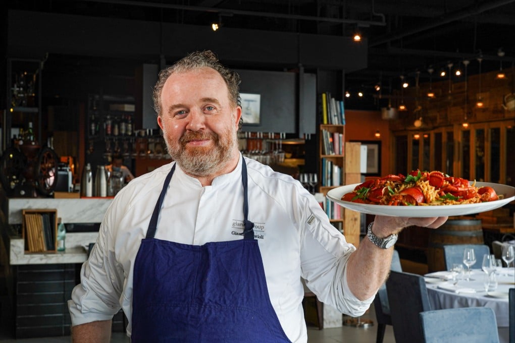 Italians are opening up grocery shops and delis, showcasing their national products. Chef Gianni Caprioli, owner of the Mercato gourmet Italian shop. Photo: Gianni Caprioli