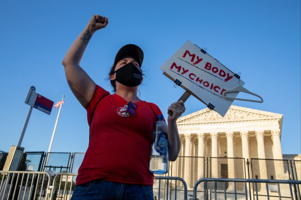 An abortion rights demonstrator protests outside the US Supreme Court on Tuesday. Photo: Bloomberg