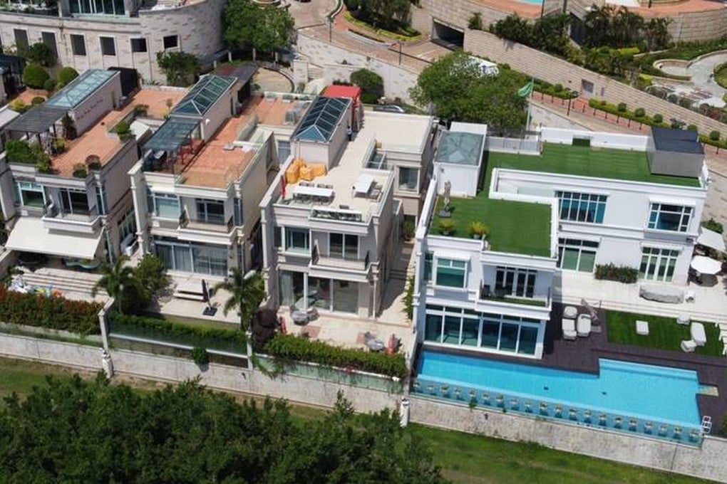 House 17 of Bel-Air Rise (second right) has been put up for sale by tender by receivers at a discount to its 2017 purchase price. Photo: Handout.