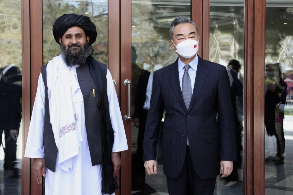 Chinese Foreign Minister Wang Yi (right) meets with Mullah Abdul Ghani Baradar, the acting deputy prime minister of the Afghan Taliban’s government, in Kabul on March 24. A US advisory panel on China was told on Thursday that despite Beijing’s ambitions to boost its regional influence, it has confronted rising resistance from extremists. Photo: Xinhua via AP