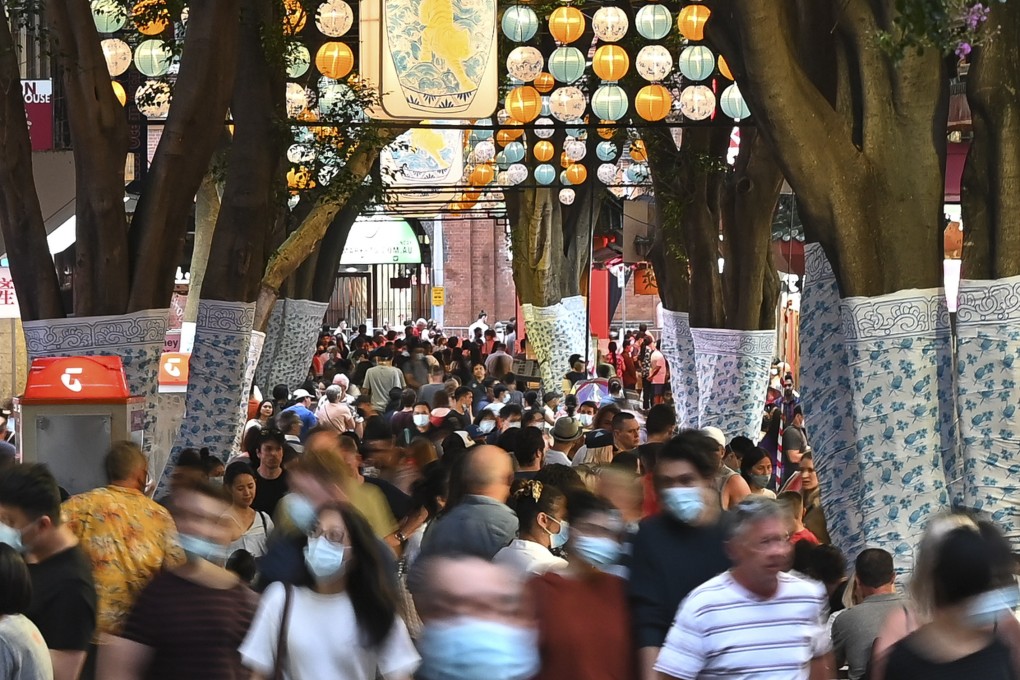 Australians enjoy the Lunar New Year celebrations in Sydney’s Chinatown on January 29, 2022. Photo: Anadolu Agency via Getty Images
