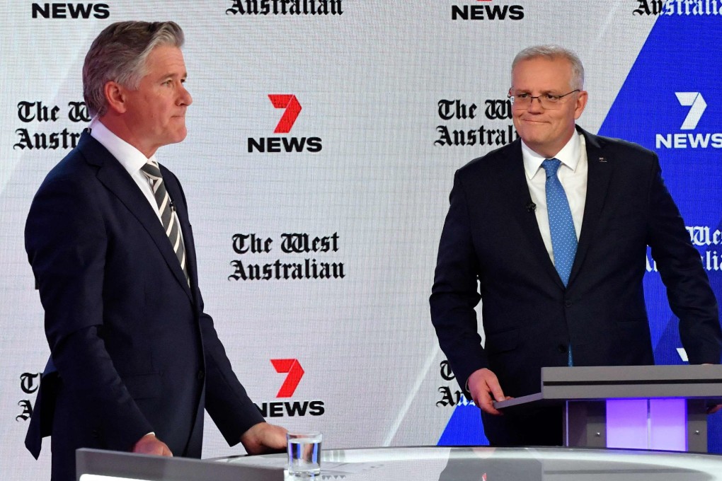 Australian Prime Minister Scott Morrison (right) and Opposition Leader, Anthony Albanese, attend the third leaders’ debate of the 2022 federal election campaign  in Sydney on Wednesday. Photo: AFP