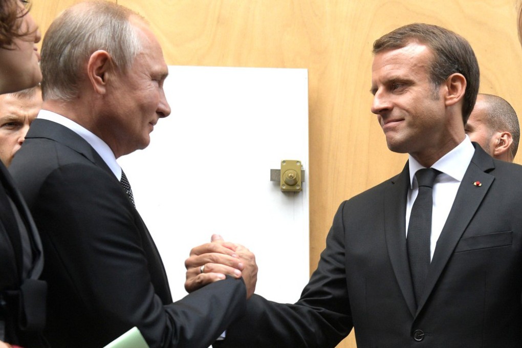 French President Emmanuel Macron greets Russian President Vladimir Putin before the funeral of former French President Jacques Chirac in 2019. Photo: dpa