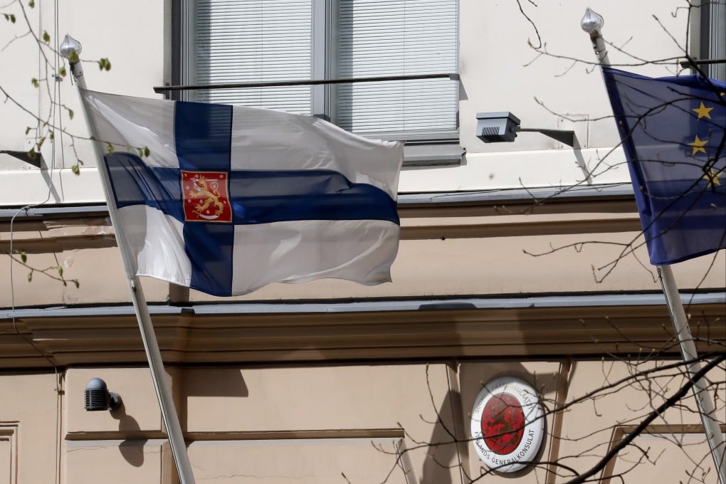 Flags fly outside the General Consulate of Finland in St Petersburg, Russia on Friday. Photo: EPA-EFE