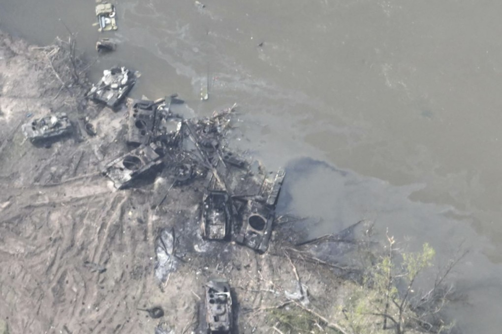 Dozens of destroyed or damaged Russian armoured vehicles are seen on the banks of the Siversky Donets River in Ukraine. Photo: Ukrainian Presidential Press Office via AP