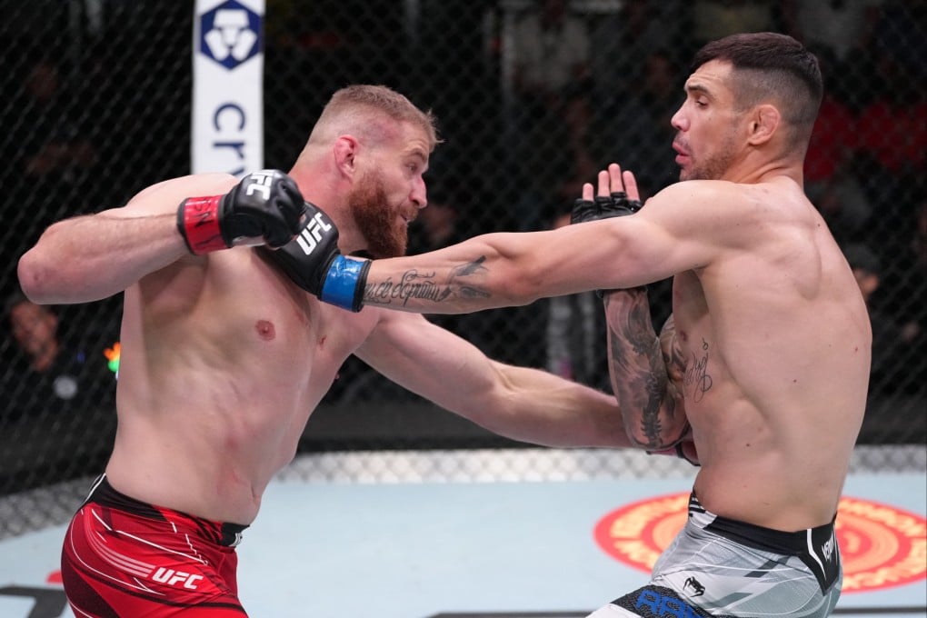 Jan Blachowicz punches Aleksandar Rakic in a light heavyweight fight at UFC Vegas 54. Photo: Zuffa LLC