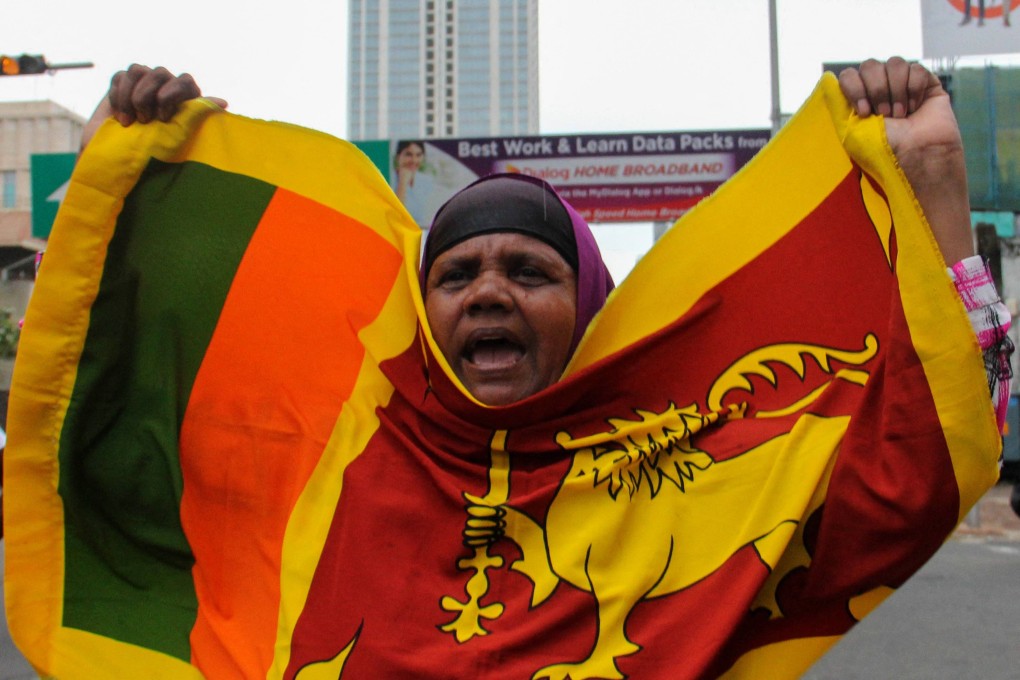 An anti-government demonstrator protests near the president’s office in Colombo. Photo: AFP