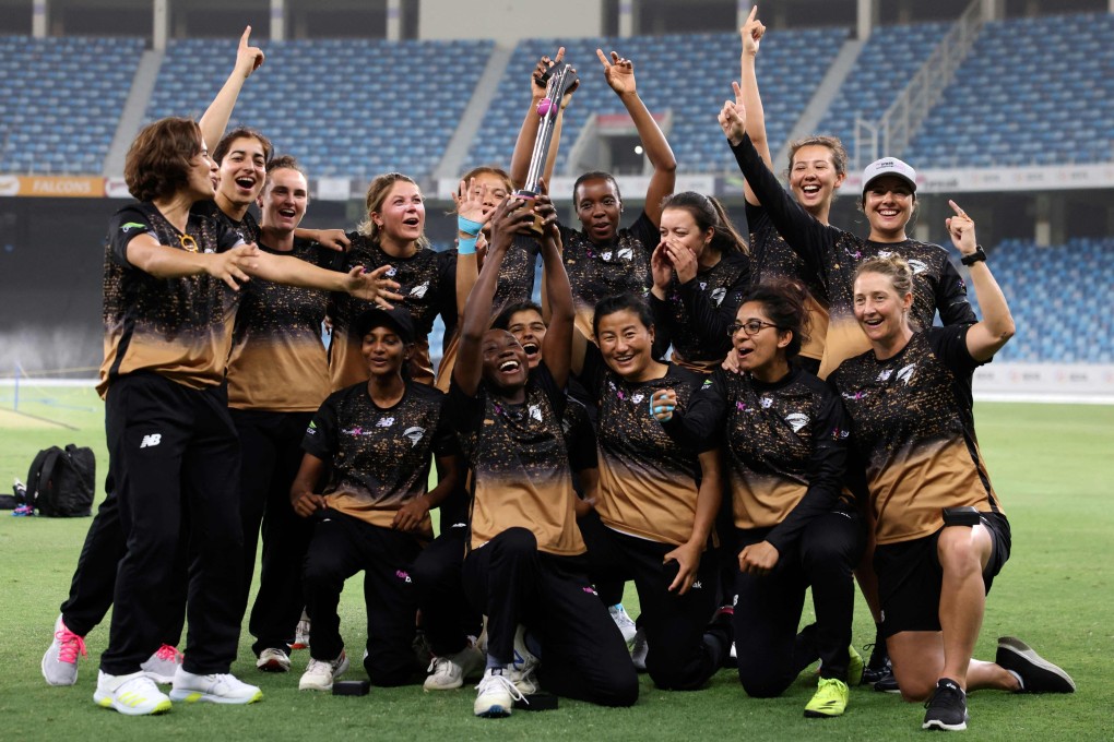Tornadoes players pose with the trophy after winning the FairBreak Invitational women’s final in Dubai. Photo: AFP