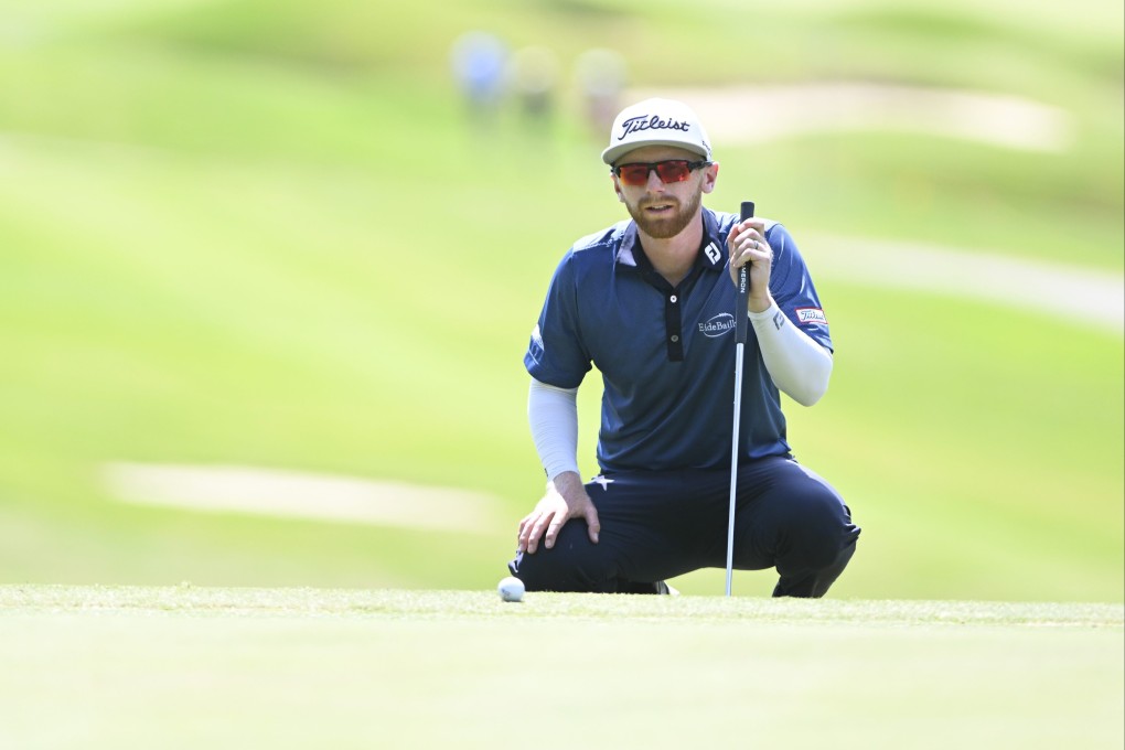 Anders Albertson lines up his putt on 18 during the final round of the Visit Knoxville Open. Photo: AFP