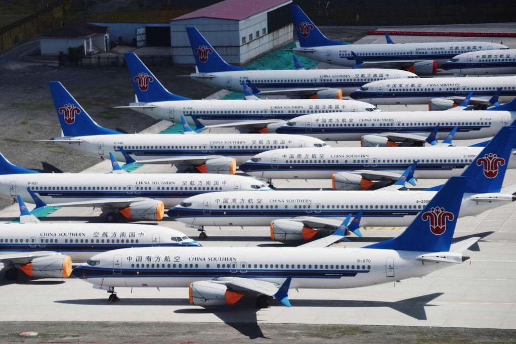 A fleet of Boeing 737 MAX aircraft bearing the livery of China Southern Airlines parked at Urumqi airport in western China’s Xinjiang regionon June 5, 2019. Photo: AFP