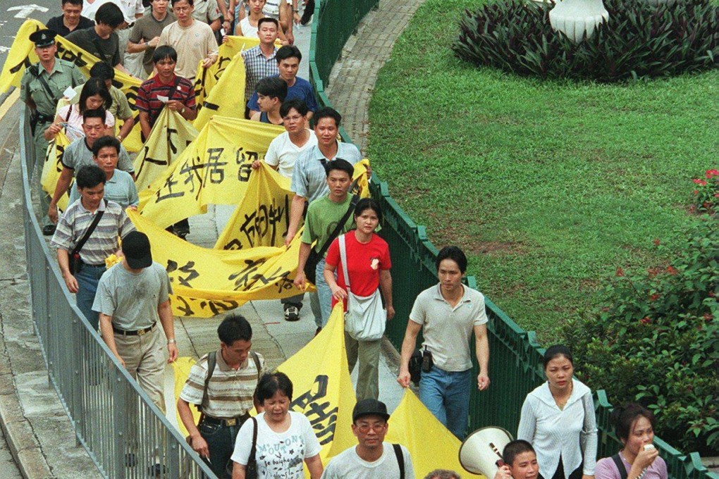 Overstayers march outside Immigration Tower after Beijing’s reinterpretation of the abode law. Photo: David Wong