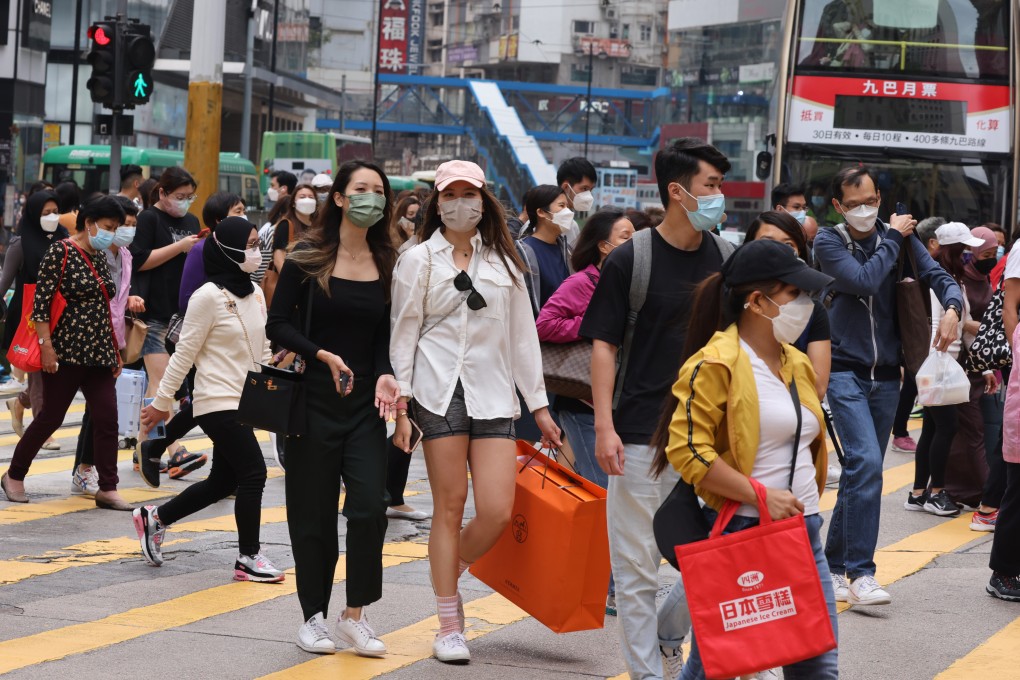 Shoppers wearing masks flock to Causeway Bay on Easter Sunday on April 17. Photo: Nora Tam
