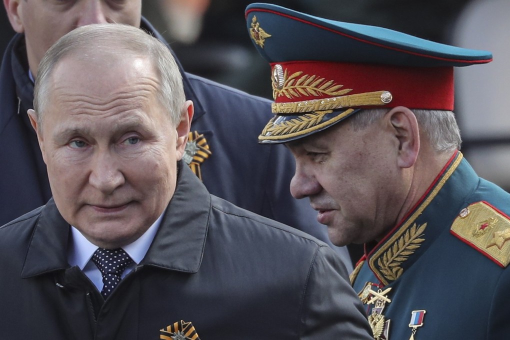 Russian President Vladimir Putin (L) and Russian Defense Minister Sergei Shoigu leave Red Square after the Victory Day military parade in Moscow, on May 9. Photo: EPA-EFE