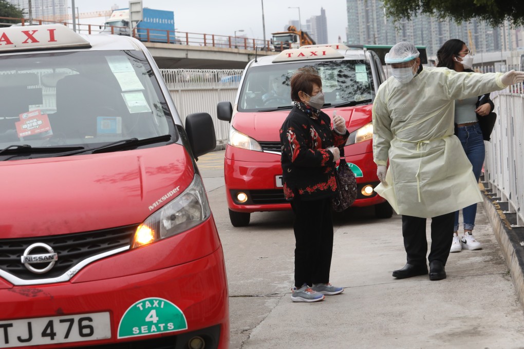 Anti-epidemic taxis stop outside Robert Black General Out-patient Clinic in San Po Kong on February 18. The taxi industry has had a rough ride in the pandemic. Photo: Jelly Tse
