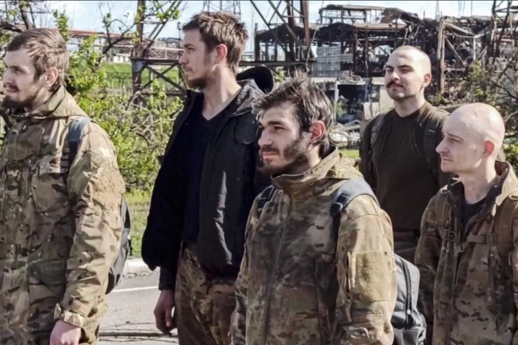 Ukrainian servicemen leave the besieged Azovstal steel plant in Mariupol on Saturday. Photo: EPA-EFE/Russian Defence Ministry Handout
