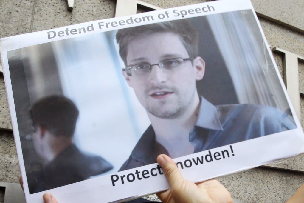 Members of the League of Social Democrats gather at the US consulate in Hong Kong in June to support whistle-blower Edward Snowden, who later left for Russia. Photo: Edward Wong