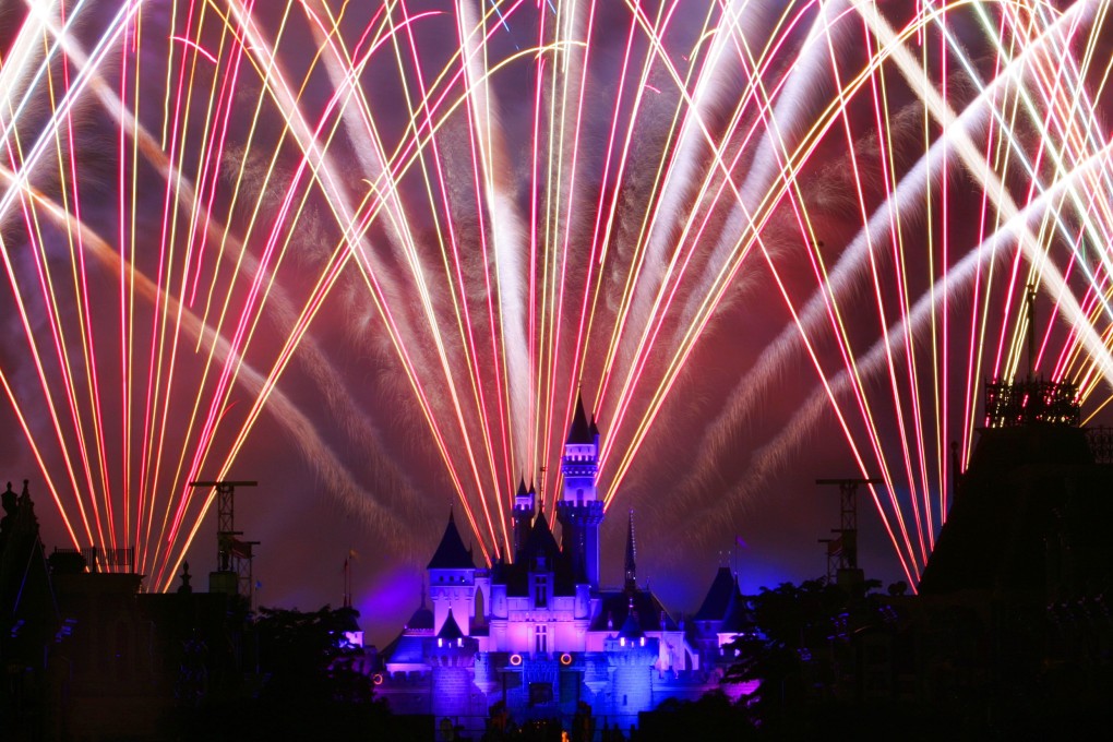 Fireworks light up the night sky in a dazzling display over the Sleeping Beauty Castle at Hong Kong Disneyland. Photo: AP