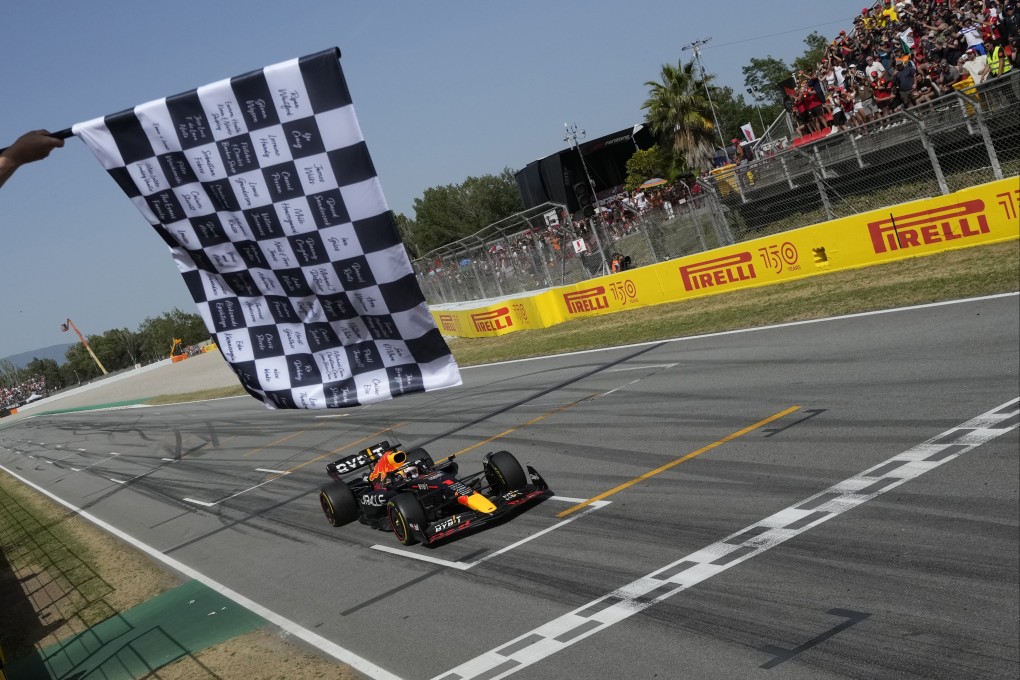 Red Bull driver Max Verstappen of the Netherlands takes the chequered flag as he wins the Spanish Grand Prix. Photo: AP
