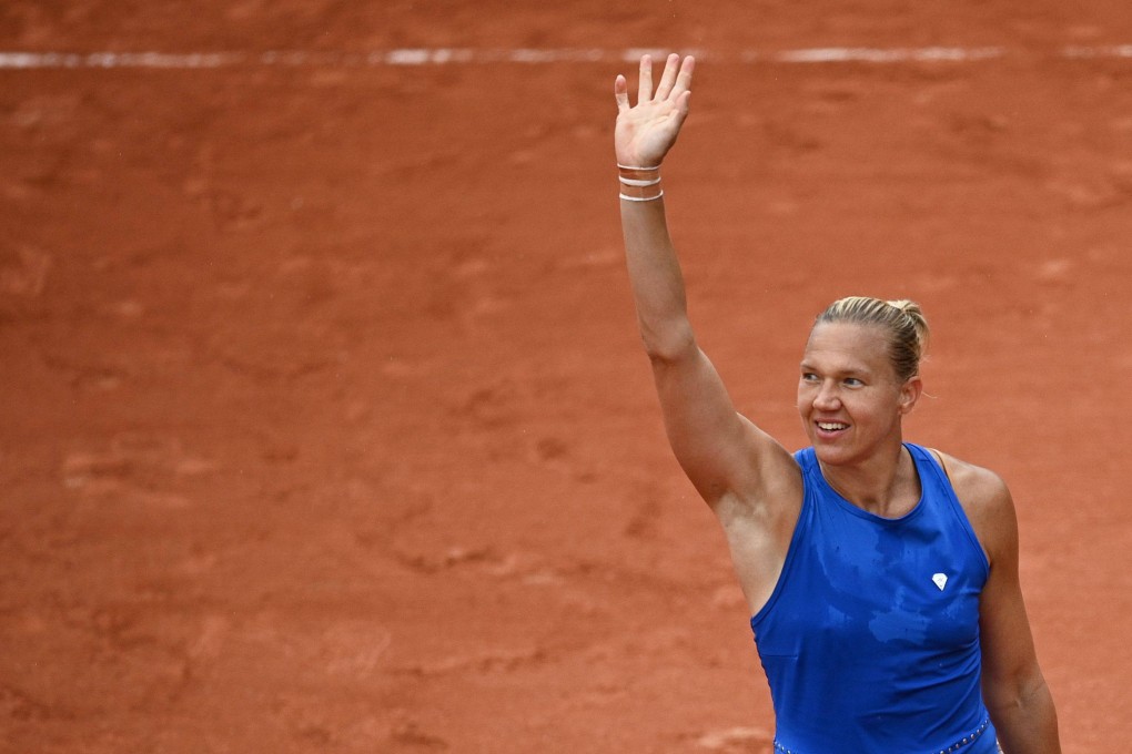 Estonia’s Kaia Kanepi waves after winning her women’s singles match against Spain’s Garbine Muguruza. Photo: AFP