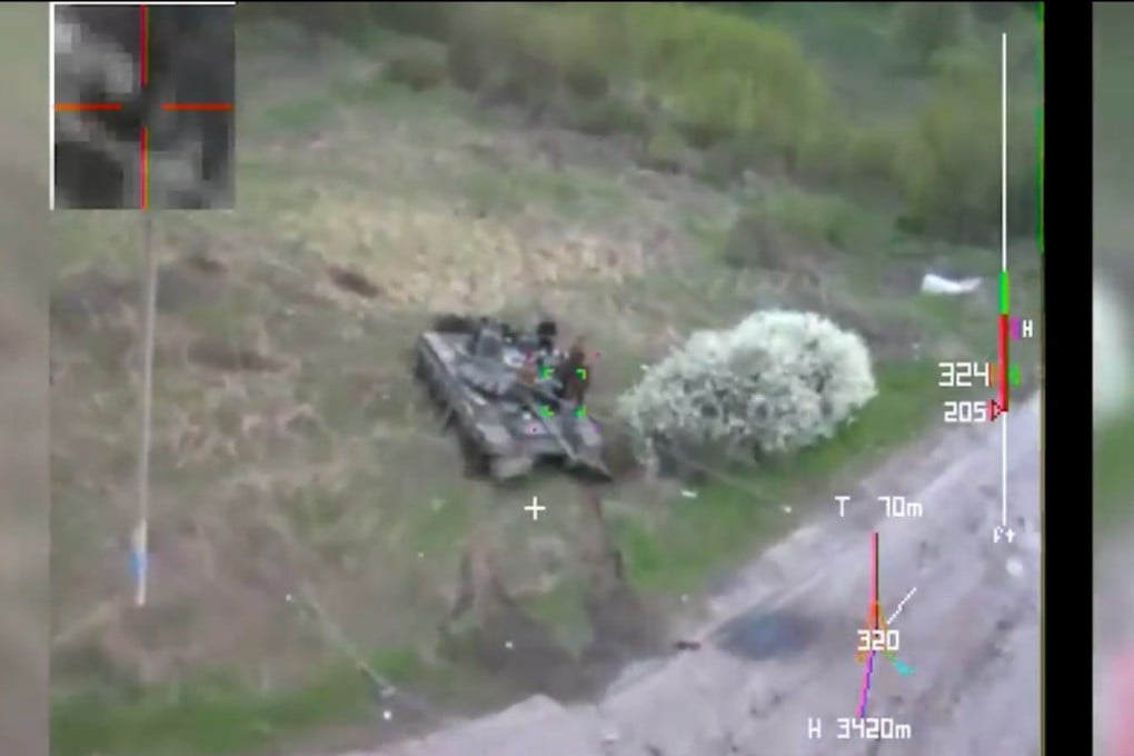 A screen grab from video footage released by Ukraine’s military shows a kamikaze or suicide drone neutralising a Russian tank. Photo: Ukraine special operations forces via Facebook