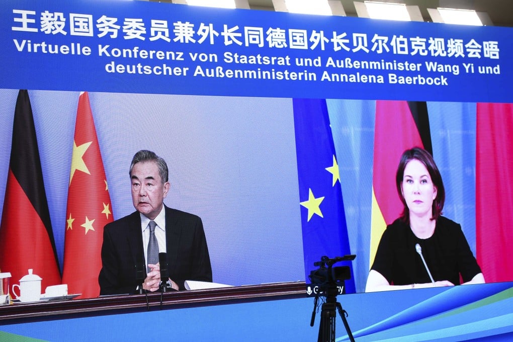 Chinese State Councillor and Foreign Minister Wang Yi and German Foreign Minister Annalena Baerbock hold a video meeting on May 24, 2022. Photo: Xinhua