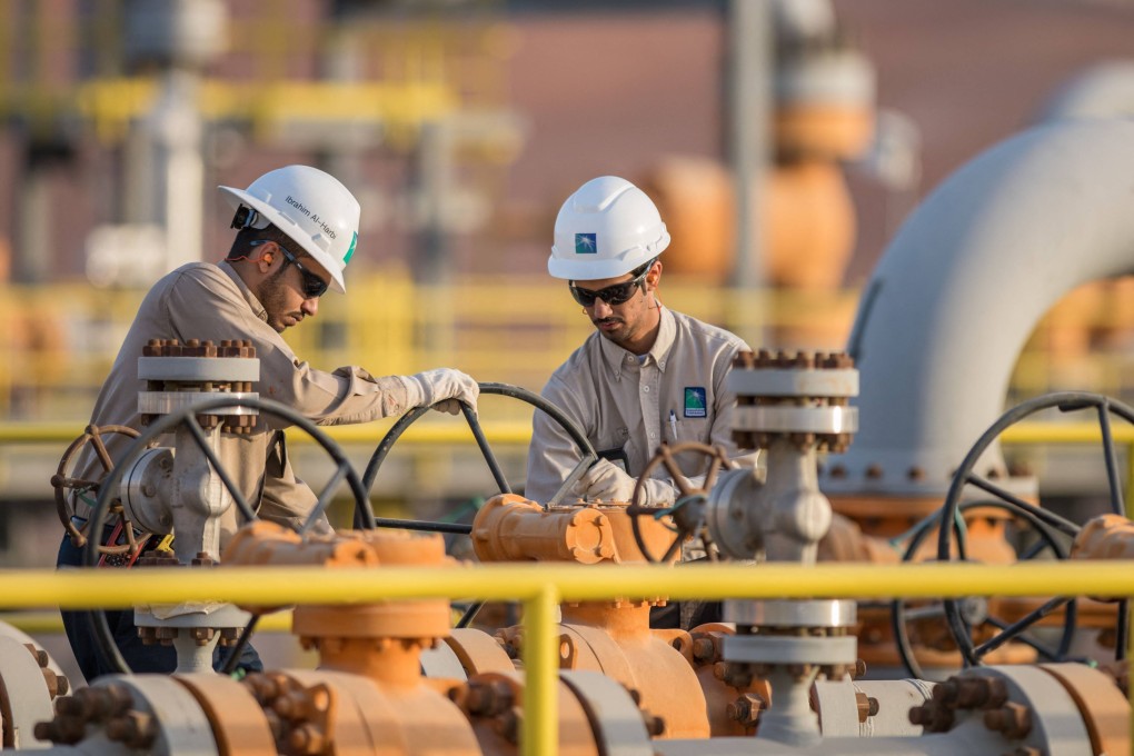 Engineers work at an oil plant in eastern Saudi Arabi. File photo: AFP