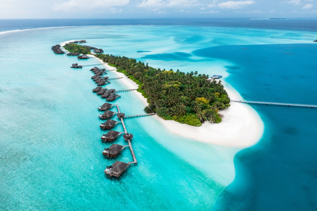 The newly renovated Conrad Maldives resort is spread over two islands, with luxury glass-bottomed villas and high-end restaurants. Photo: yashlightroom