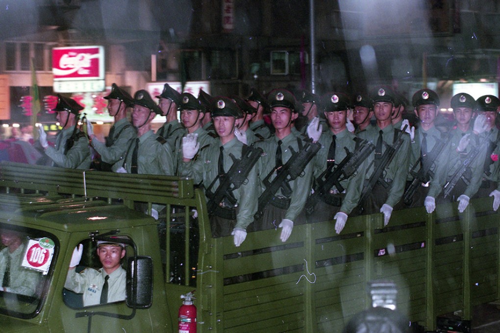PLA troops enter Hong Kong on July 1, 1997, the morning after the handover in this photo from the HK 1997 exhibition by Birdy Chu. Photo: Yrellag Gallery/Birdy Chu