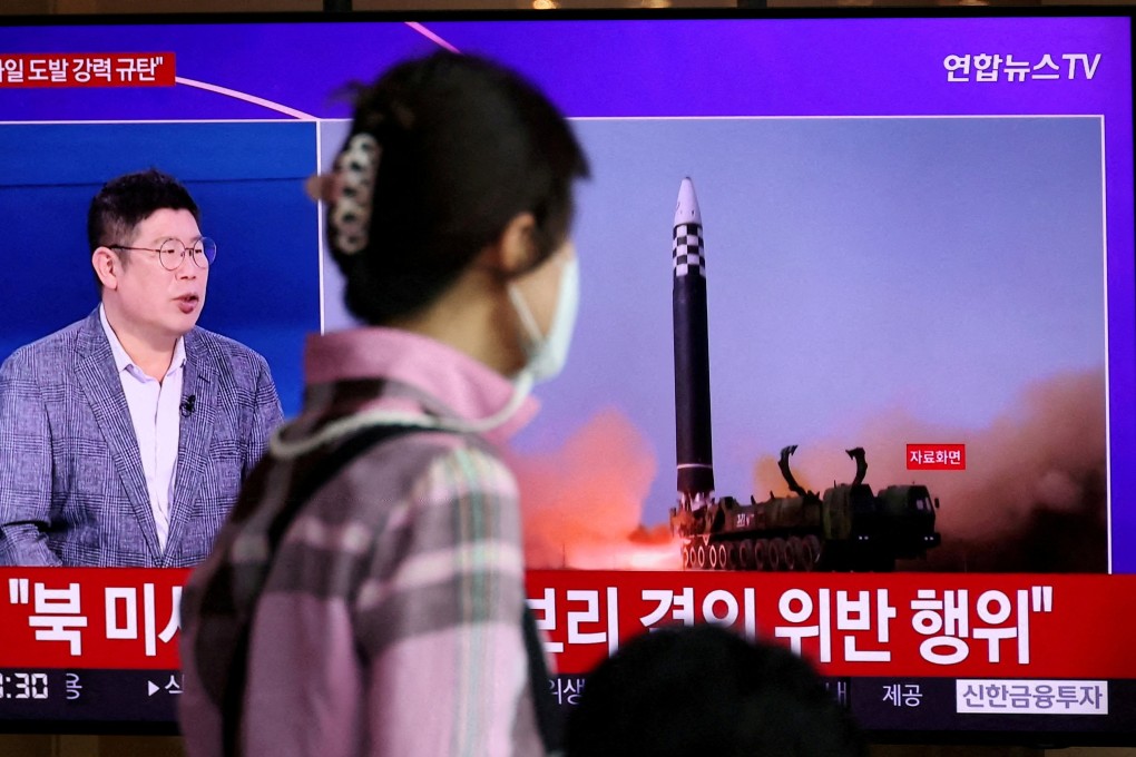 A woman in Seoul on Wednesday watches a news report on North Korea’s launch of three missiles, including one thought to be an intercontinental ballistic missile. Photo: Reuters