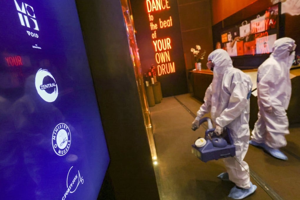 Cleaners disinfect Zentral in California Tower in Lan Kwai Fong. Photo: Dickson Lee