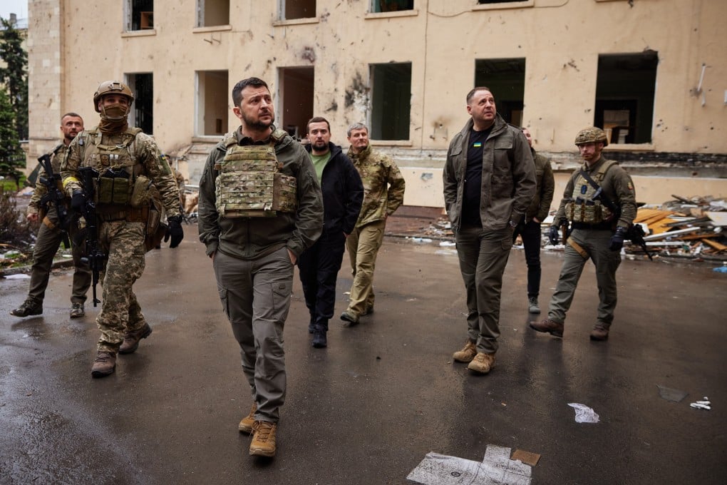 Ukrainian President Volodymyr Zelensky meets soldiers while inspecting destroyed buildings during a visit to his nation’s eastern region of Kharkiv. Photo: via dpa