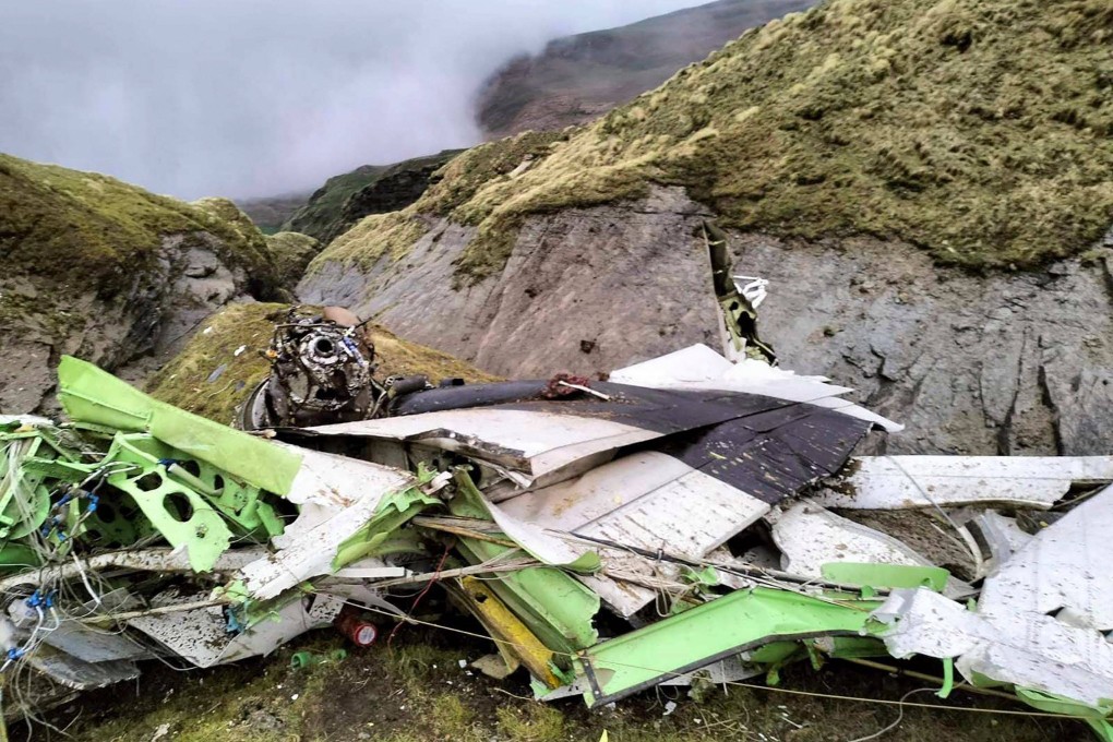 The wreckage is strewn across a steep slope at an altitude of around 14,500 feet. Photo: AFP