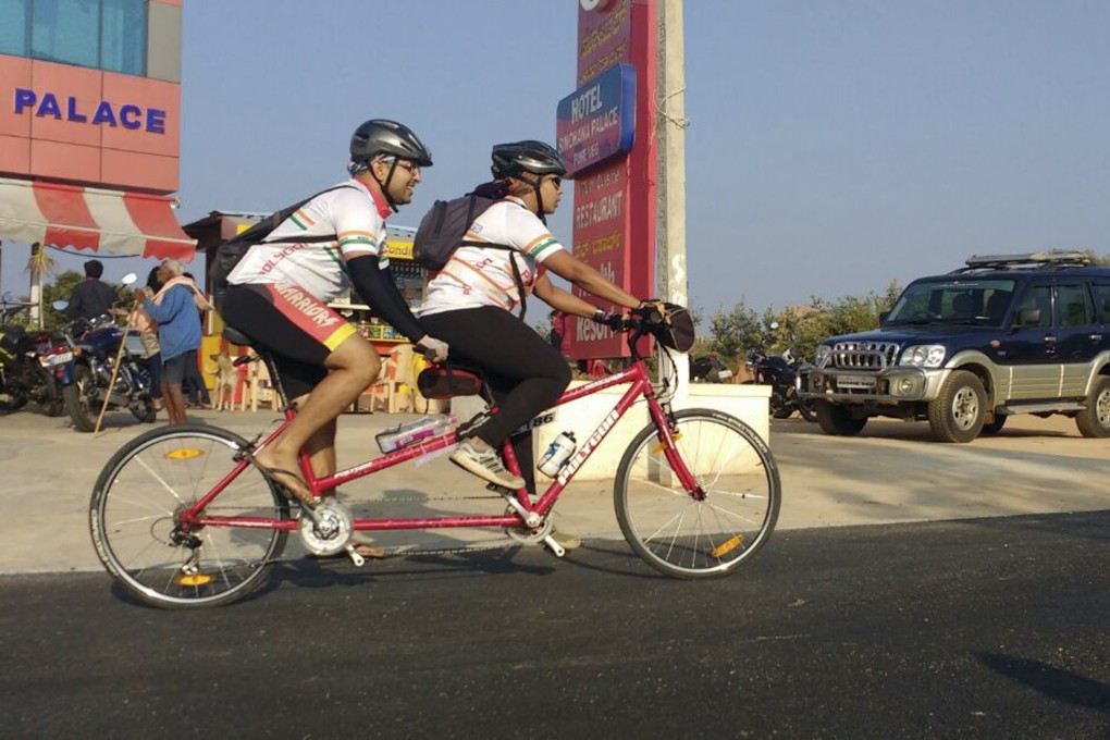 An Indian mother of two has cycled around her country on a tandem, ridden from south to north, and broken a number of records. Photo: Meera Velanka