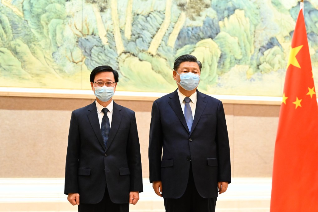 Chinese President Xi Jinping (right) with Hong Kong Chief Executive-elect John Lee in Beijing. Photo: Xinhua