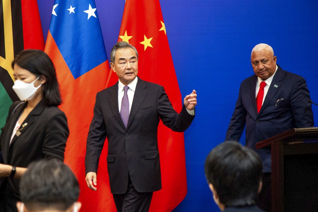 Chinese Foreign Minister Wang Yi leaves after a joint press conference with Fijian Prime Minister Frank Bainimarama in Fiji’s capital city Suva. Photo: AFP