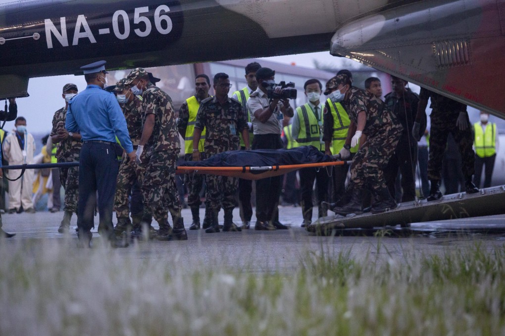 Nepalese officials on Tuesday confirmed all 22 people on board a plane that crashed two days earlier were killed after rescuers found and recovered the final body from the wreckage. Photo: Xinhua