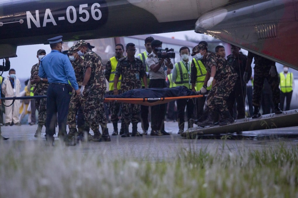 Nepalese officials on Tuesday confirmed all 22 people on board a plane that crashed two days earlier were killed after rescuers found and recovered the final body from the wreckage. Photo: Xinhua