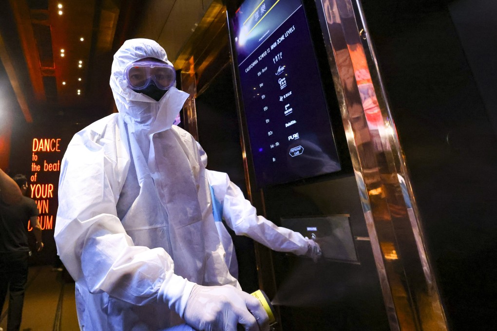 Cleaners disinfect Zentral club in Lan Kwai Fong following an outbreak of Covid-19 at the venue. Photo: Dickson Lee