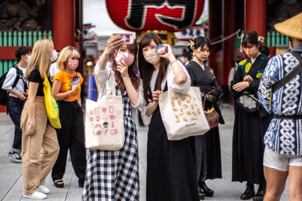 People visit the Sensoji Temple, a tourist spot in Tokyo on May 30, 2022 as Japan earlier announced borders reopen to tourists on guided tours starting. Photo: AFP