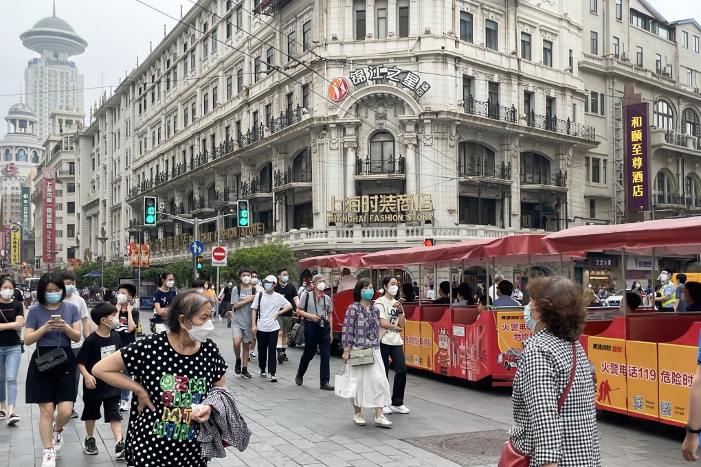 At Shanghai’s Nanjing Road, traffic are back as the financial hub lifted lockdown after two months.
Photo: Tracy Qu