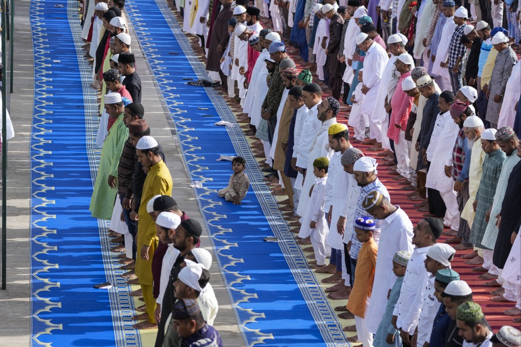 Elders offer prayers at Jama Mosque in Ahmedabad, India – Muslims account for about 14 per cent of India’s 1.4 billion population. Photo: AP
