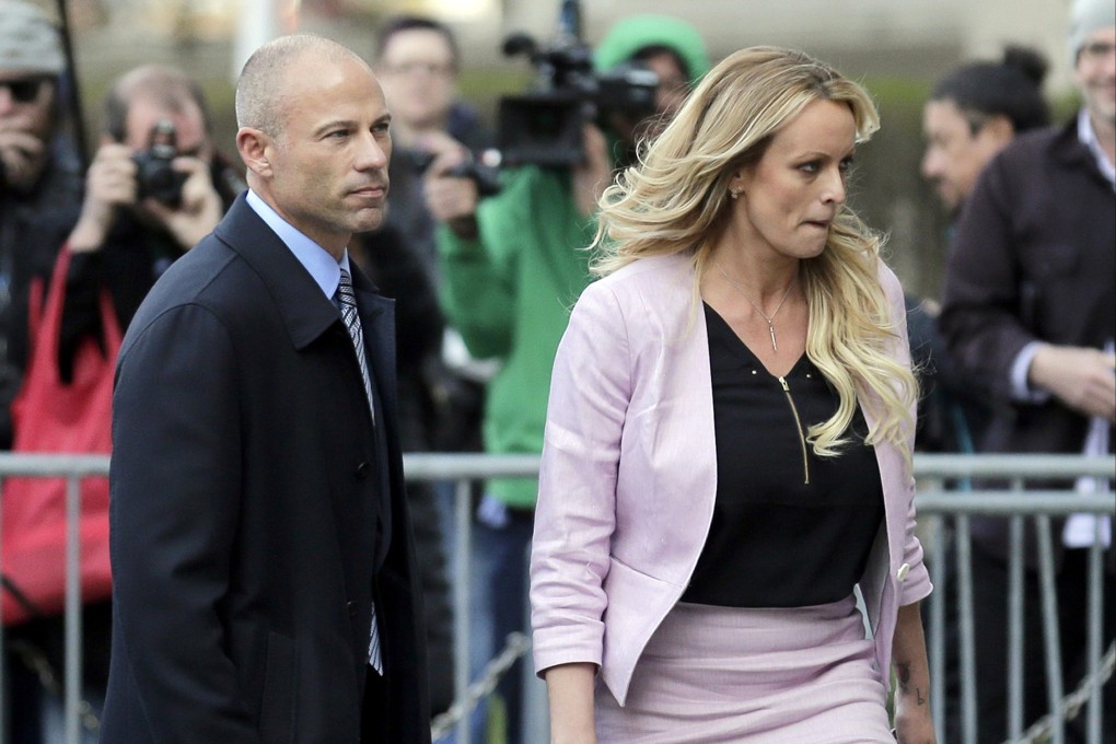 Stormy Daniels and her lawyer Michael Avenatti leave federal court in New York in April 2018. Photo: AP