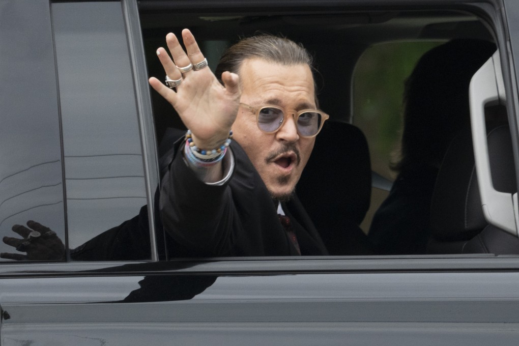 Johnny Depp waves to fans as he leaves court during the defamation case involving ex-wife Amber Heard in Fairfax, in the US state of Virginia. Both will now be trying to rebuild their images and careers. Photo: Getty Images
