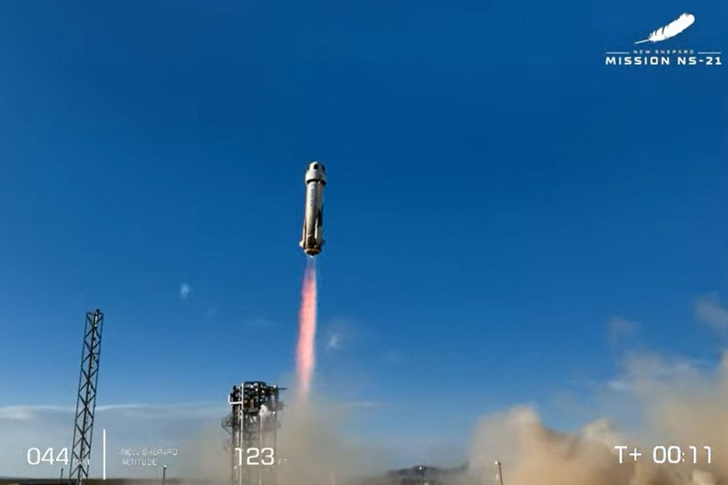 The Blue Origin New Shepard rocket launches from West Texas on Saturday June 4. Photo: AFP