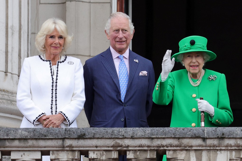 Britain’s Queen Elizabeth, right, with Prince Charles and Camilla, Duchess of Cornwall on the balcony at Buckingham Palace in London on Sunday. Photo: Reuters