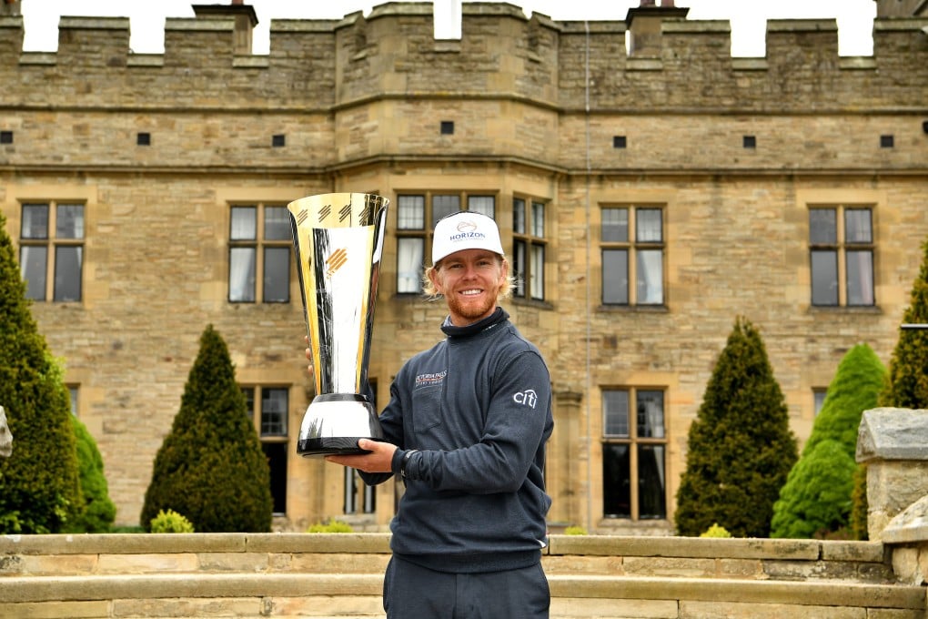 Scott Vincent with the winner’s trophy at Slaley Hall Hotel, Spa and Golf Resort. Photo: Asian Tour