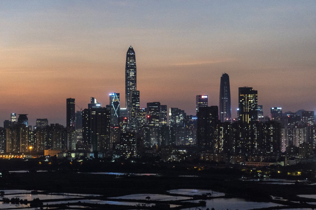 The Shenzhen skyline seen at dusk from the Lok Ma Chau area in Hong Kong. The southern Chinese tech hub wants to become a powerhouse in semiconductors. Photo: Bloomberg