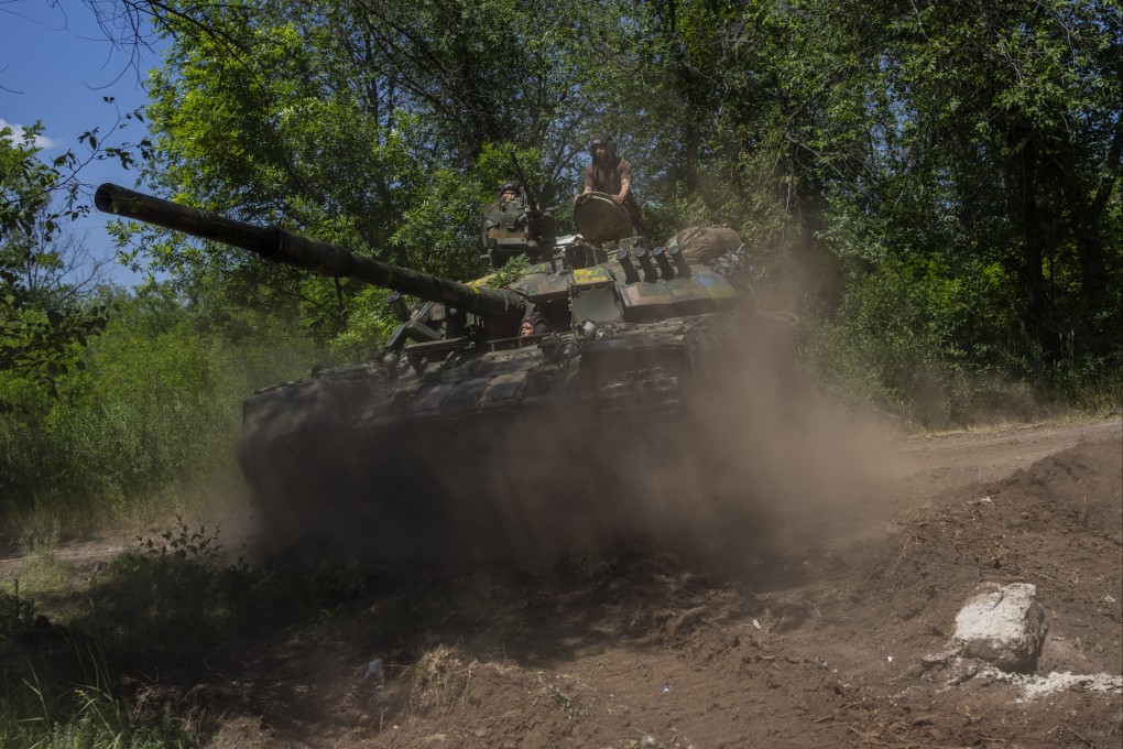Ukrainian servicemen operate a tank near the frontline in Donetsk region on Monday. Photo: AP