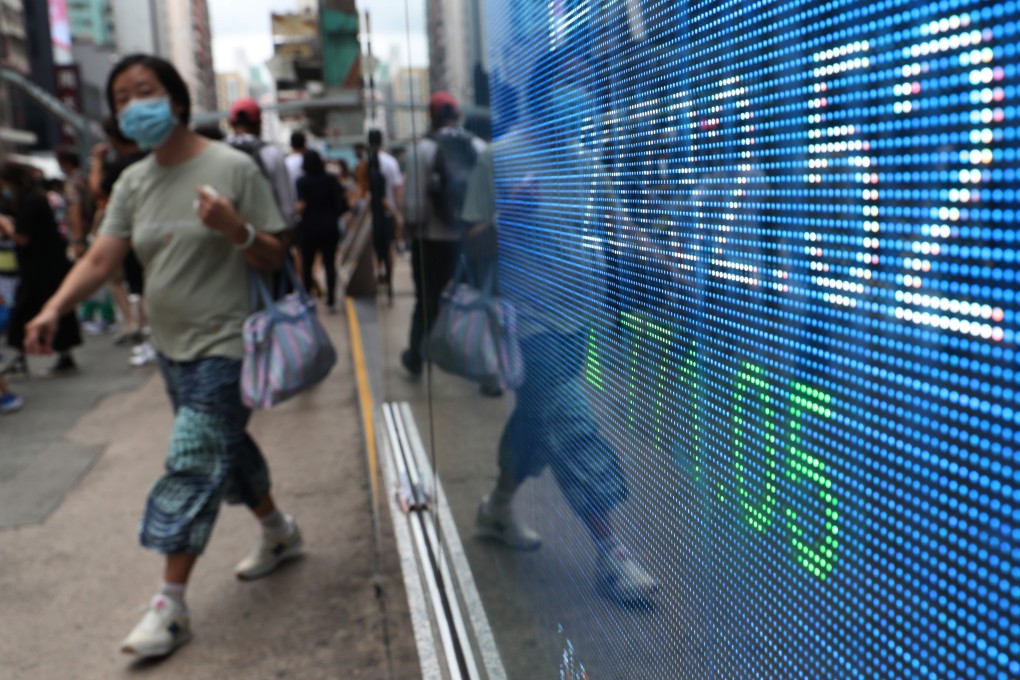 An electronic board showing the Hang Seng Index outside a bank in Mong Kok, Hong Kong. Photo: Edmond So